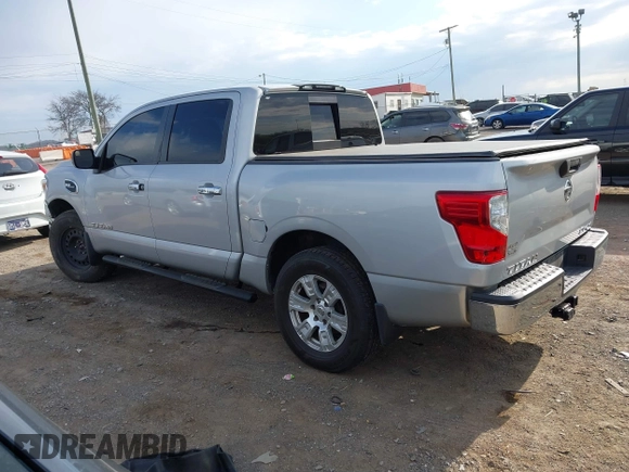 2017 Nissan Titan SV with VIN 1N6AA1EJ3HN538034, listed as a IAAI auction lot 41863785 with 204,198 mi miles and . Bid and sale history available at DreamBid. Image 14.