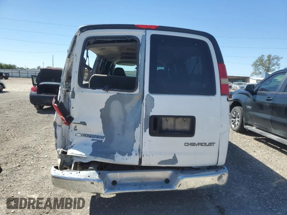 2005 Chevrolet Express Passenger with VIN 1GAHG39U051232615, listed as a Copart auction lot 73574264 with 207,303 mi miles and Salvage title. Bid and sale history available at DreamBid. Image 6.