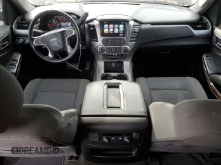 2018 Chevrolet Tahoe LS z VIN 1GNSKAKC8JR215839, wystawiony jako Copart lot #52627955 z przebiegiem 96 380 mil mil oraz Szkoda całkowita • Salvage title. Historia ofert i sprzedaży dostępna na DreamBid. Obrazek 8.