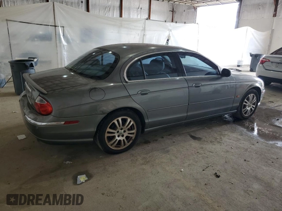 2003 Jaguar S-Type z VIN SAJEA01U93HM88490, wystawiony jako Copart lot #55721795 z przebiegiem 192 773 mil mil oraz Tytuł czysty. Historia ofert i sprzedaży dostępna na DreamBid. Obrazek 3.