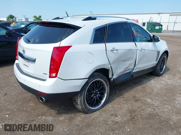 2013 Cadillac SRX Performance Collection with VIN 3GYFNHE3XDS520177, listed as a IAAI auction lot 42536457 with 217,963 mi miles and . Bid and sale history available at DreamBid. Image 4.