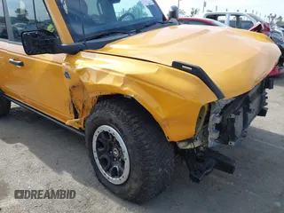 2022 Ford Bronco with VIN 1FMEE5DH6NLB14350, listed as a IAAI auction lot 41486823 with 27,587 mi miles and . Bid and sale history available at DreamBid. Image 6.