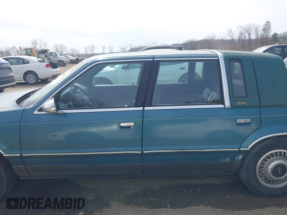 1993 Chrysler New Yorker z VIN 1C3XV66R5PD188692, wystawiony jako IAAI lot #41832600 z przebiegiem 146 380 mil mil oraz . Historia ofert i sprzedaży dostępna na DreamBid. Obrazek 14.