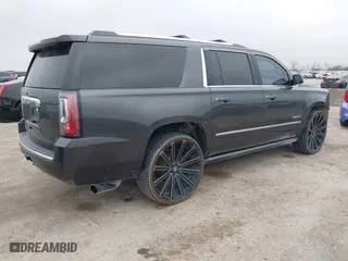 2016 GMC Yukon XL Denali with VIN 1GKS1HKJ7GR186012, listed as a IAAI auction lot 41473177 with 156,280 mi miles. Bid and sale history available at carsss.com. Image 4.