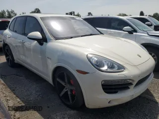 2012 Porsche Cayenne S Hybrid with VIN WP1AE2A25CLA90443, listed as a Copart auction lot 60108595 with 141,595 mi miles and Clean title. Bid and sale history available at DreamBid. Image 4.