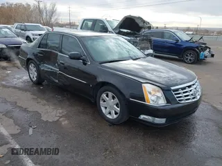 2006 Cadillac DTS w/1SC with VIN 1G6KD57Y96U251691, listed as a IAAI auction lot 41086147 with 128,959 mi miles. Bid and sale history available at carsss.com. Image 1.
