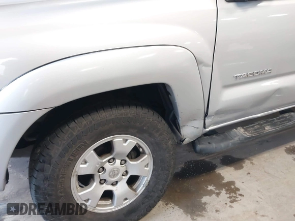 2011 Toyota Tacoma with VIN 3TMMU4FN1BM031502, listed as a IAAI auction lot 41333647 with 151,373 mi miles and . Bid and sale history available at DreamBid. Image 6.
