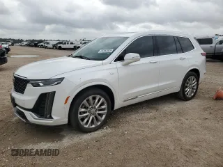 2021 Cadillac XT6 Premium Luxury with VIN 1GYKPCRSXMZ169206, listed as a Copart auction lot 55953525 with 64,789 mi miles and Salvage Title. Bid and sale history available at DreamBid. Image 1.
