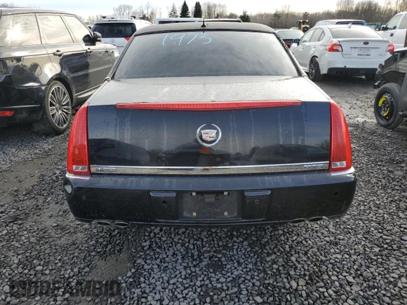 2006 Cadillac DTS 1SD z VIN 1G6KD57Y16U140102, wystawiony jako Copart lot #46145435 z przebiegiem 95 567 mil mil oraz Szkody całkowita. Historia ofert i sprzedaży dostępna na DreamBid. Obrazek 6.