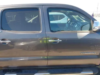 2013 Toyota Tacoma PreRunner with VIN 5TFJU4GN2DX031877, listed as a IAAI auction lot 41532757 with 176,797 mi miles. Bid and sale history available at carsss.com. Image 13.