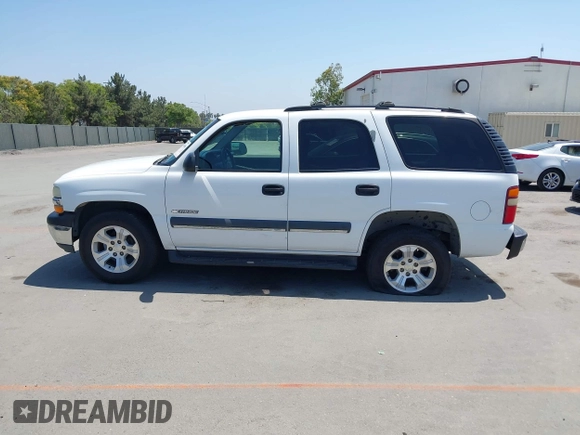 2003 Chevrolet Tahoe LS with VIN 1GNEC13V73R265144, listed as a IAAI auction lot 42464386 with 238,249 mi miles and . Bid and sale history available at DreamBid. Image 14.