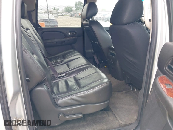 2011 Chevrolet Suburban LT with VIN 1GNSCJE05BR294452, listed as a IAAI auction lot 42107580 with 165,313 mi miles and . Bid and sale history available at DreamBid. Image 8.