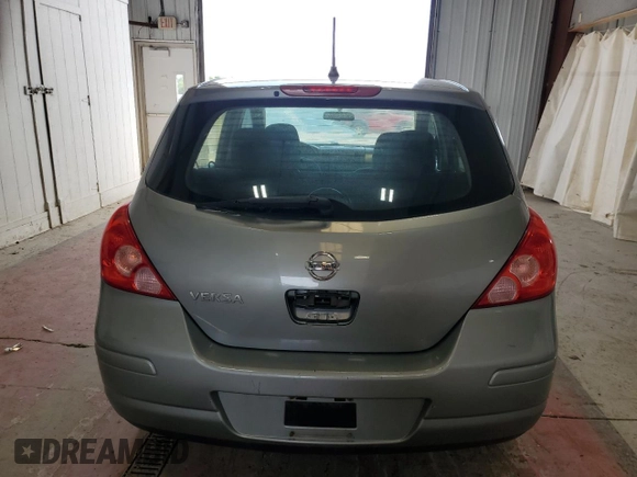2011 Nissan Versa S z VIN 3N1BC1CP7BL409393, wystawiony jako Copart lot #60806585 z przebiegiem 147 149 mil mil oraz Szkoda całkowita • Salvage title. Historia ofert i sprzedaży dostępna na DreamBid. Obrazek 6.