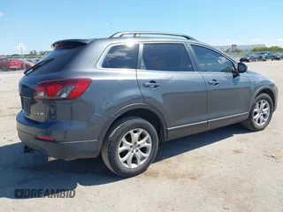 2015 Mazda CX-9 Sport with VIN JM3TB2BA7F0465965, listed as a IAAI auction lot 40348982 with 165,284 mi miles and . Bid and sale history available at carsss.com. Image 4.