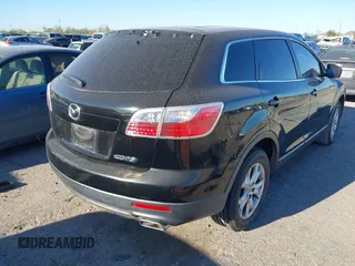 2011 Mazda CX-9 Touring with VIN JM3TB2CA8B0330180, listed as a IAAI auction lot 41819115 with 196,238 mi miles and . Bid and sale history available at DreamBid. Image 4.