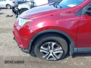 2018 Toyota RAV4 LE with VIN JTMBFREV2JD228186, listed as a IAAI auction lot 42076730 with 93,899 mi miles. Bid and sale history available at carsss.com. Image 18.