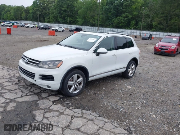 2012 Volkswagen Touareg Sport z VIN WVGEF9BP0CD006506, wystawiony jako IAAI lot #42355432 z przebiegiem 175 346 mil mil oraz . Historia ofert i sprzedaży dostępna na DreamBid. Obrazek 17.