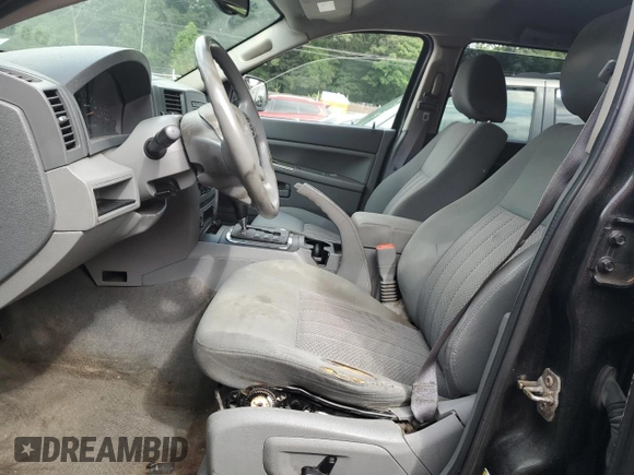 2005 Jeep Grand Cherokee Laredo с VIN 1J4HR48N25C604066, выставлен на аукционе Copart как лот 64397505 с пробегом 151 504 миль миль и Списание • Salvage title. История ставок и продаж доступна на DreamBid. Изображение 7.
