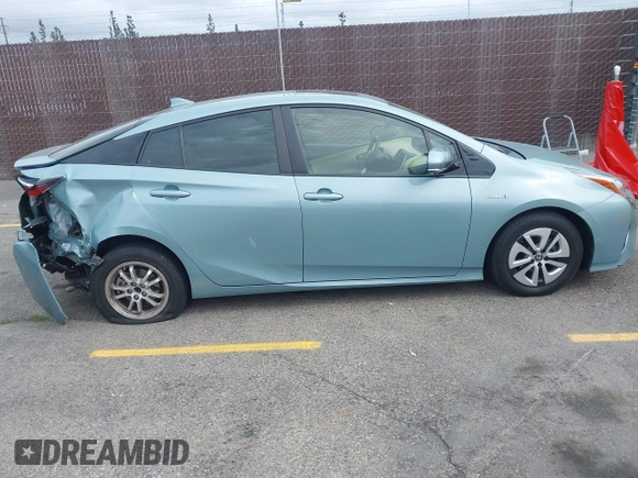 2016 Toyota Prius Four z VIN JTDKARFU8G3018145, wystawiony jako IAAI lot #42195308 z przebiegiem 87 649 mil mil oraz . Historia ofert i sprzedaży dostępna na DreamBid. Obrazek 13.