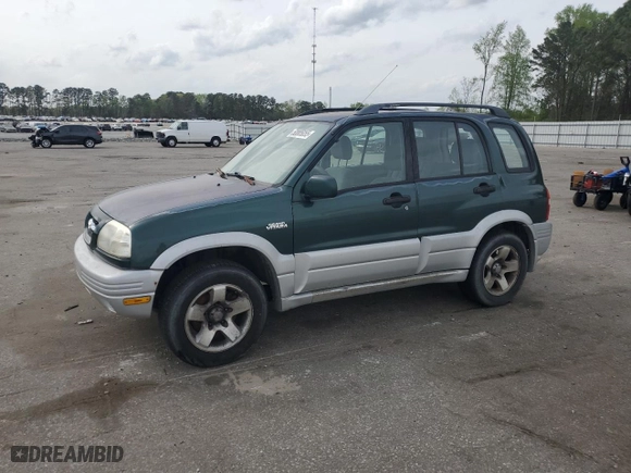 1999 Suzuki Grand Vitara LX with VIN JS3TD62V0X4124366, listed as a Copart auction lot 50885055 with 204,168 mi miles and Salvage Title. Bid and sale history available at carsss.com. Image 1.