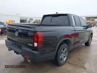 2022 Honda Ridgeline RTL-E with VIN 5FPYK3F75NB020036, listed as a IAAI auction lot 41500206 with 79,655 mi miles and . Bid and sale history available at DreamBid. Image 4.