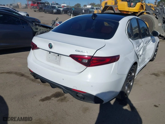 2019 Alfa Romeo Giulia Ti with VIN ZARFAMBN0K7606230, listed as a IAAI auction lot 41421769 with 69,274 mi miles. Bid and sale history available at carsss.com. Image 4.