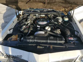1975 Oldsmobile Cutlass z VIN 3J57T5M323248, wystawiony jako Copart lot #80526124 z przebiegiem 13 934 mil mil oraz Szkody całkowita. Historia ofert i sprzedaży dostępna na DreamBid. Obrazek 12.
