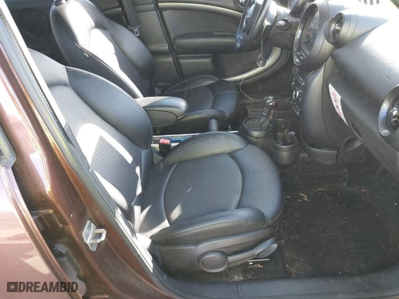 2015 MINI Cooper Countryman S with VIN WMWZC5C55FWP47826, listed as a IAAI auction lot 41342674 with 94,683 mi miles. Bid and sale history available at carsss.com. Image 5.