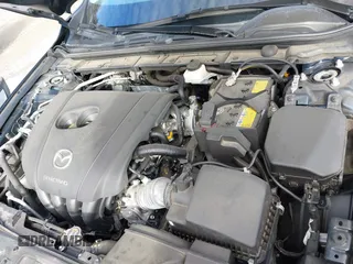 2021 Mazda 3 S with VIN JM1BPAAL5M1344295, listed as a IAAI auction lot 41499549 with 35,513 mi miles and . Bid and sale history available at DreamBid. Image 10.