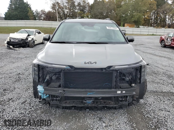 2025 Kia Carnival SX Prestige with VIN KNDNE5K33S6479557, listed as a Copart auction lot 79474994 with 327 mi miles and Salvage Title. Bid and sale history available at DreamBid. Image 5.