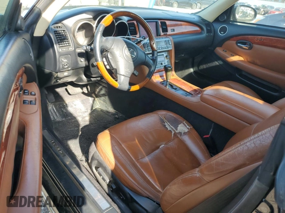 2004 Lexus SC 430 z VIN JTHFN48Y540055464, wystawiony jako Copart lot #52192445 z przebiegiem 188 693 mil mil oraz Szkoda całkowita • Salvage title. Historia ofert i sprzedaży dostępna na DreamBid. Obrazek 8.