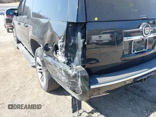 2014 Cadillac Escalade ESV Premium z VIN 1GYS4JEF7ER143539, wystawiony jako IAAI lot #41802142 z przebiegiem 174 584 mil mil oraz . Historia ofert i sprzedaży dostępna na DreamBid. Obrazek 17.