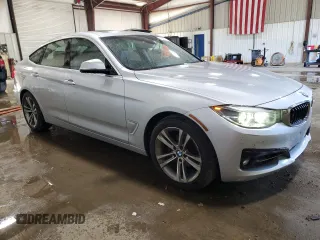 2018 BMW 3 Series 330i xDrive with VIN WBA8Z9C52JG828741, listed as a Copart auction lot 61457015 with 87,064 mi miles and Salvage title. Bid and sale history available at DreamBid. Image 4.