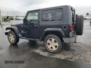 2009 Jeep Wrangler Sahara with VIN 1J4FA54109L702963, listed as a Copart auction lot 89211555 with 125,138 mi miles and Clean title. Bid and sale history available at DreamBid. Image 2.