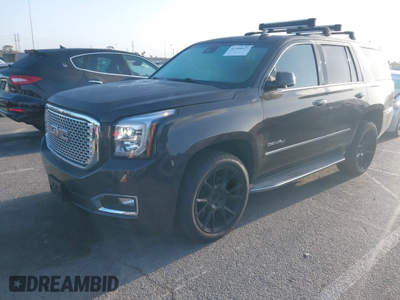 2015 GMC Yukon Denali z VIN 1GKS1CKJ7FR566419, wystawiony jako IAAI lot #41948825 z przebiegiem 235 037 mil mil oraz . Historia ofert i sprzedaży dostępna na DreamBid. Obrazek 17.