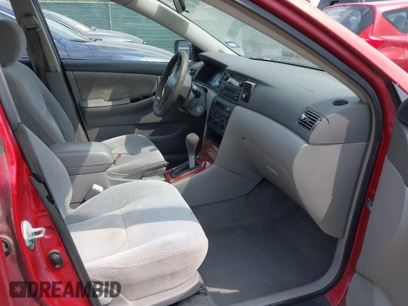 2004 Toyota Corolla CE with VIN 1NXBR32E14Z265397, listed as a IAAI auction lot 42182313 with 200,035 mi miles. Bid and sale history available at carsss.com. Image 5.