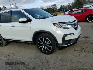 2021 Honda Pilot Touring 8-Passenger with VIN 5FNYF5H92MB001840, listed as a Copart auction lot 43236895 with 63,402 mi miles and Salvage Title. Bid and sale history available at DreamBid. Image 11.
