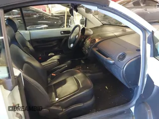 2006 Volkswagen Beetle z VIN 3VWRF31Y36M320055, wystawiony jako IAAI lot #42015054 z przebiegiem 123 350 mil mil oraz . Historia ofert i sprzedaży dostępna na DreamBid. Obrazek 5.