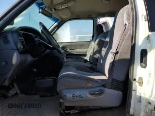 1999 Dodge Ram 2500 with VIN 3B7KF23Z6XG236963, listed as a Copart auction lot 69101424 with 0 mi miles and Salvage Title. Bid and sale history available at carsss.com. Image 7.