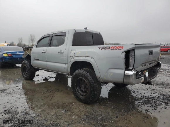 2019 Toyota Tacoma 4WD SR with VIN 3TMCZ5AN3KM256031, listed as a Copart auction lot 86110064 with 144,914 mi miles and Salvage Title. Bid and sale history available at carsss.com. Image 2.