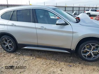 2019 BMW X1 sDrive28i with VIN WBXHU7C52K3H44360, listed as a IAAI auction lot 41709431 with 56,432 mi miles. Bid and sale history available at carsss.com. Image 14.
