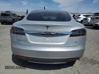 2014 Tesla Model S 60 with VIN 5YJSA1H11EFP49407, listed as a Copart auction lot 52215955 with 109,827 mi miles and Salvage Title. Bid and sale history available at DreamBid. Image 6.