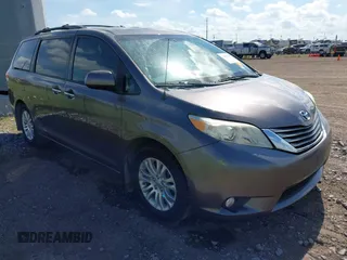 2014 Toyota Sienna XLE with VIN 5TDYK3DC5ES425205, listed as a IAAI auction lot 42605739 with 135,504 mi miles and . Bid and sale history available at DreamBid. Image 1.