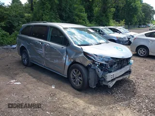 2021 Toyota Sienna LE with VIN 5TDKRKEC6MS065404, listed as a IAAI auction lot 42770185 with 109,958 mi miles and . Bid and sale history available at DreamBid. Image 1.