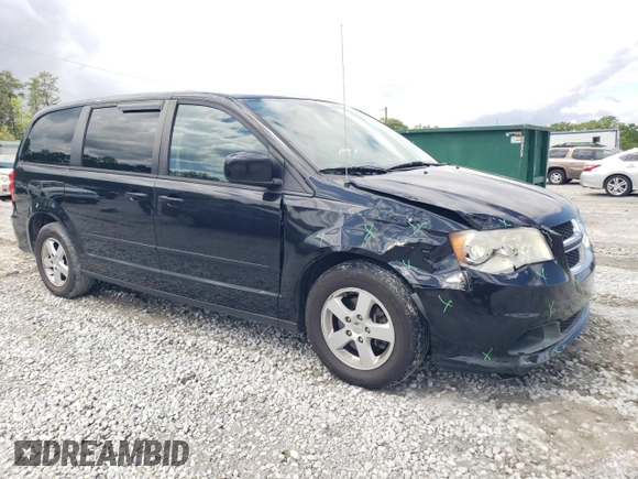 2013 Dodge Grand Caravan SXT with VIN 2C4RDGCG0DR523978, listed as a Copart auction lot 52805515 with 176,515 mi miles and Salvage Title. Bid and sale history available at DreamBid. Image 4.