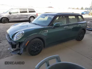 2016 MINI Clubman z VIN WMWLN5C5XG2E31611, wystawiony jako Copart lot #47943125 z przebiegiem 106 571 mil mil oraz Szkody całkowita. Historia ofert i sprzedaży dostępna na DreamBid. Obrazek 1.