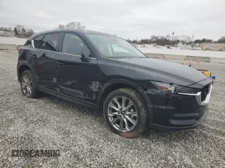 2021 Mazda CX-5 Grand Touring with VIN JM3KFBDM3M1423520, listed as a Copart auction lot 49423225 with 38,918 mi miles and Salvage Title. Bid and sale history available at carsss.com. Image 4.