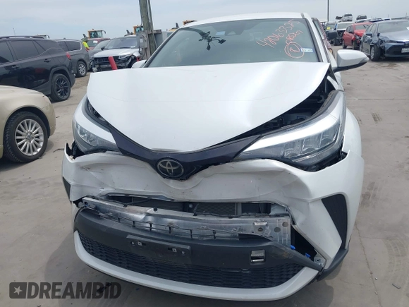 2022 Toyota C-HR XLE z VIN NMTKHMBX2NR144638, wystawiony jako IAAI lot #42063325 z przebiegiem 22 823 mil mil oraz . Historia ofert i sprzedaży dostępna na DreamBid. Obrazek 12.