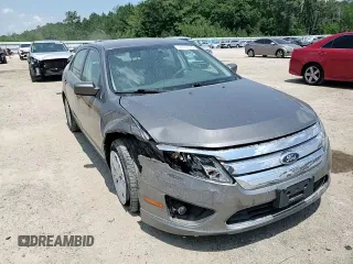 2012 Ford Fusion SE z VIN 3FAHP0HA0CR328833, wystawiony jako Copart lot #57631955 z przebiegiem 94 613 mil mil oraz Szkoda całkowita • Salvage title. Historia ofert i sprzedaży dostępna na DreamBid. Obrazek 13.