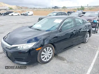 2016 Honda Civic Sedan LX with VIN 2HGFC2F53GH520801, listed as a IAAI auction lot 41788490 with 77,406 mi miles. Bid and sale history available at carsss.com. Image 17.